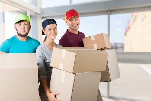 Office furniture being carefully moved during a local relocation