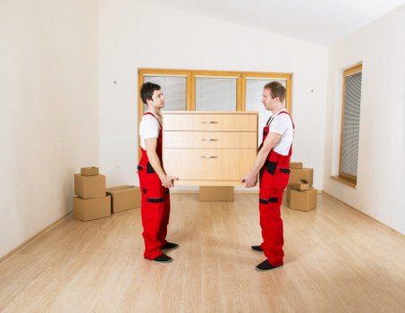 Packed office furniture and equipment ready for move