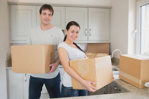 Local moving team handling furniture with care in Croydon